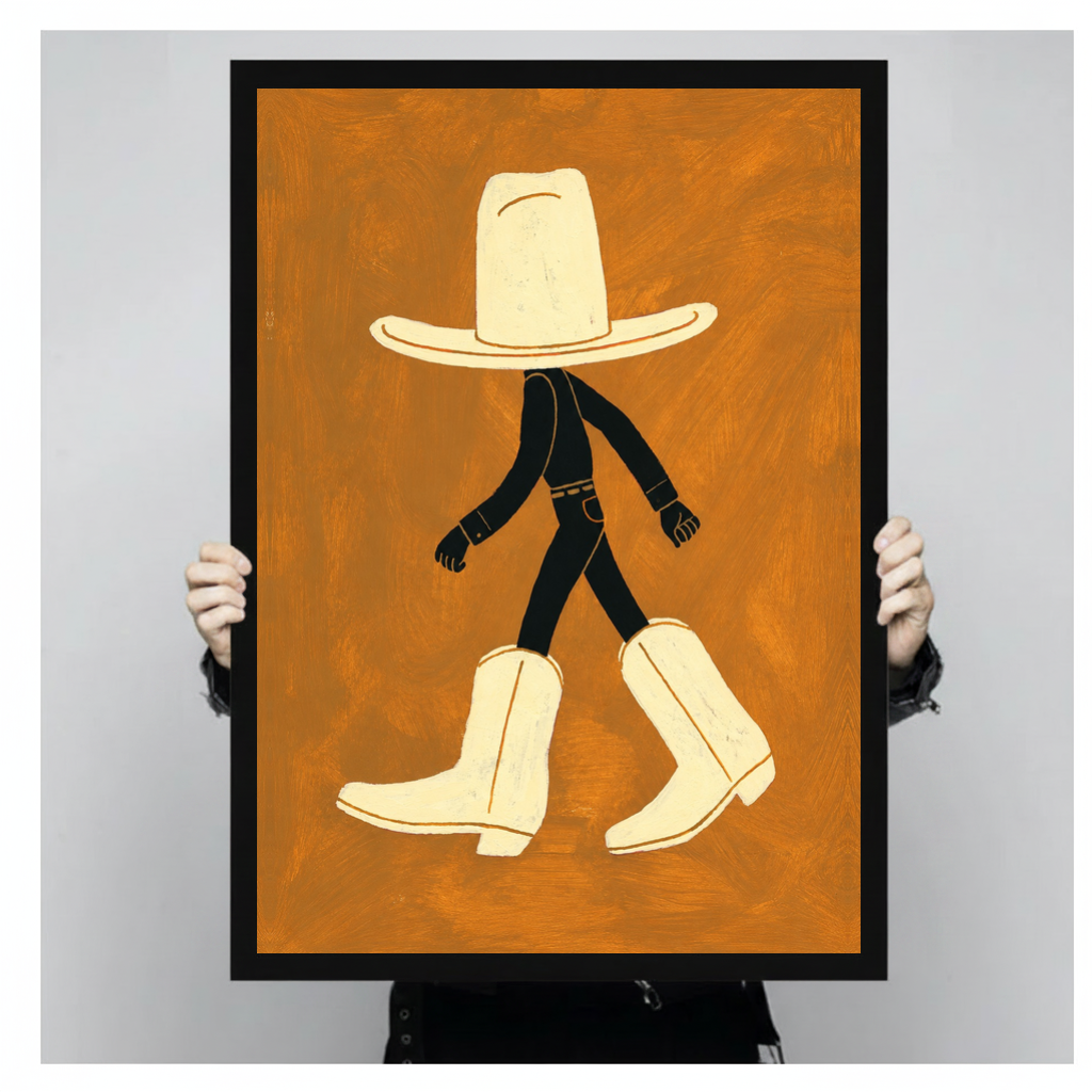 Framed walking hat and boots canvas held by a person against a light neutral background.