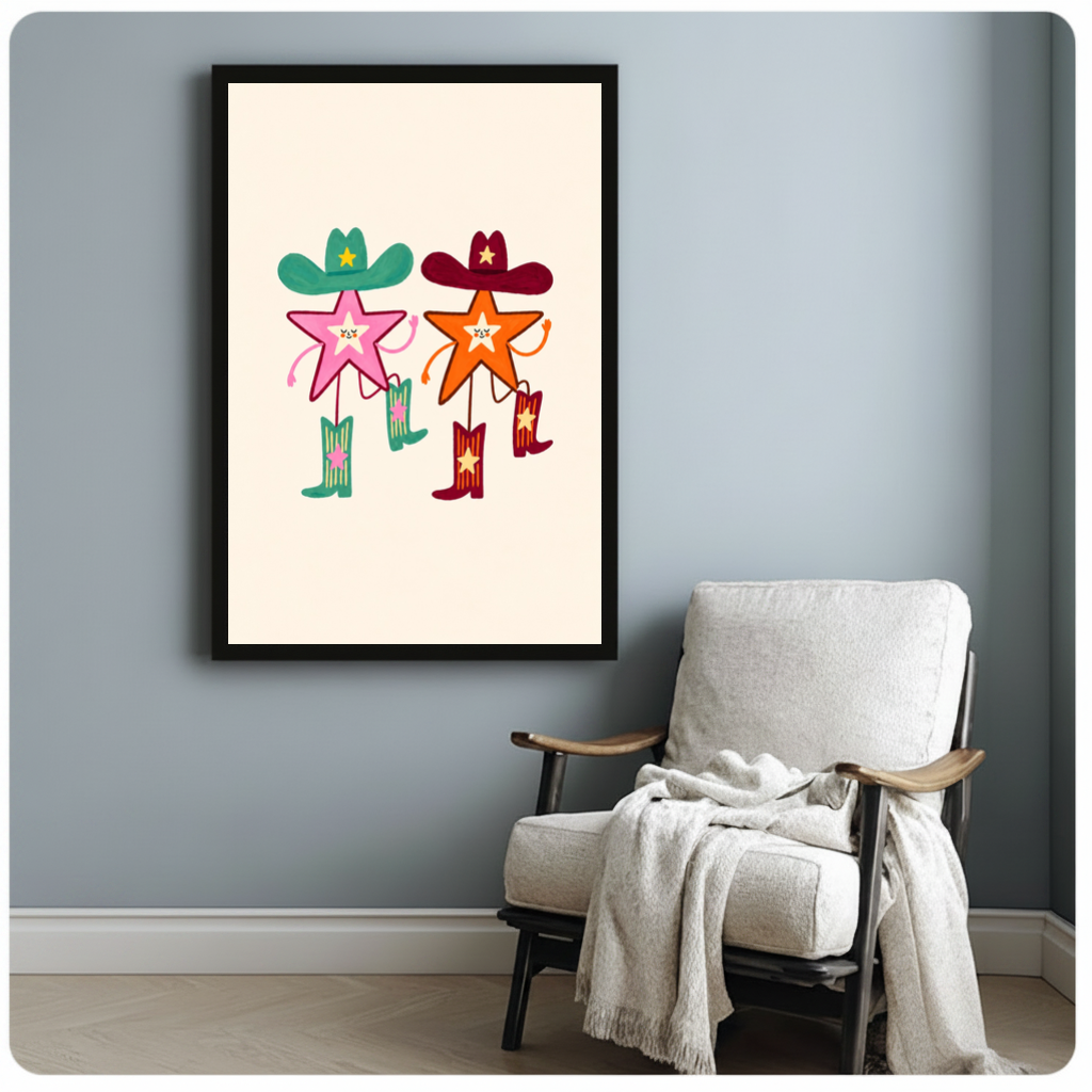 Framed two cowboy stars canvas beside a pale reading chair on a blue gray wall.