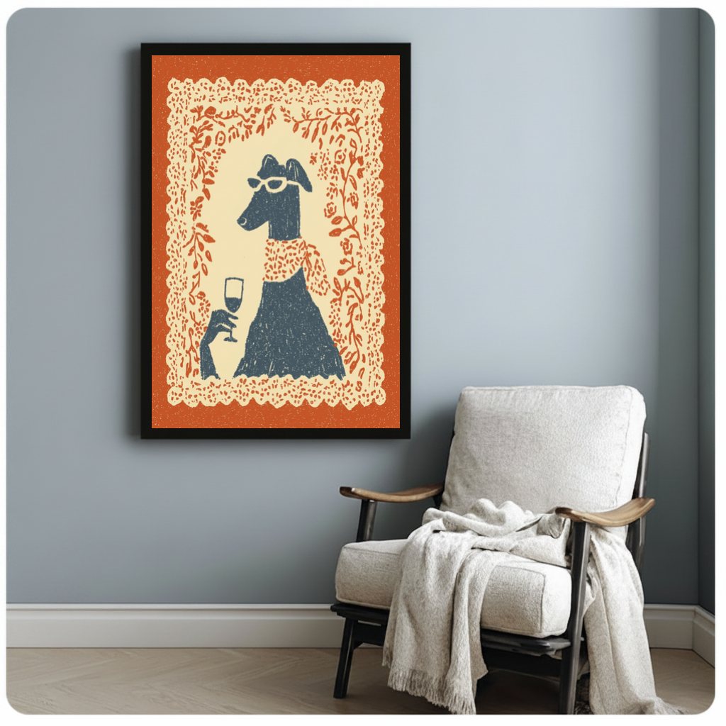Framed sunglasses wine dog canvas beside a pale reading chair on a blue gray wall.