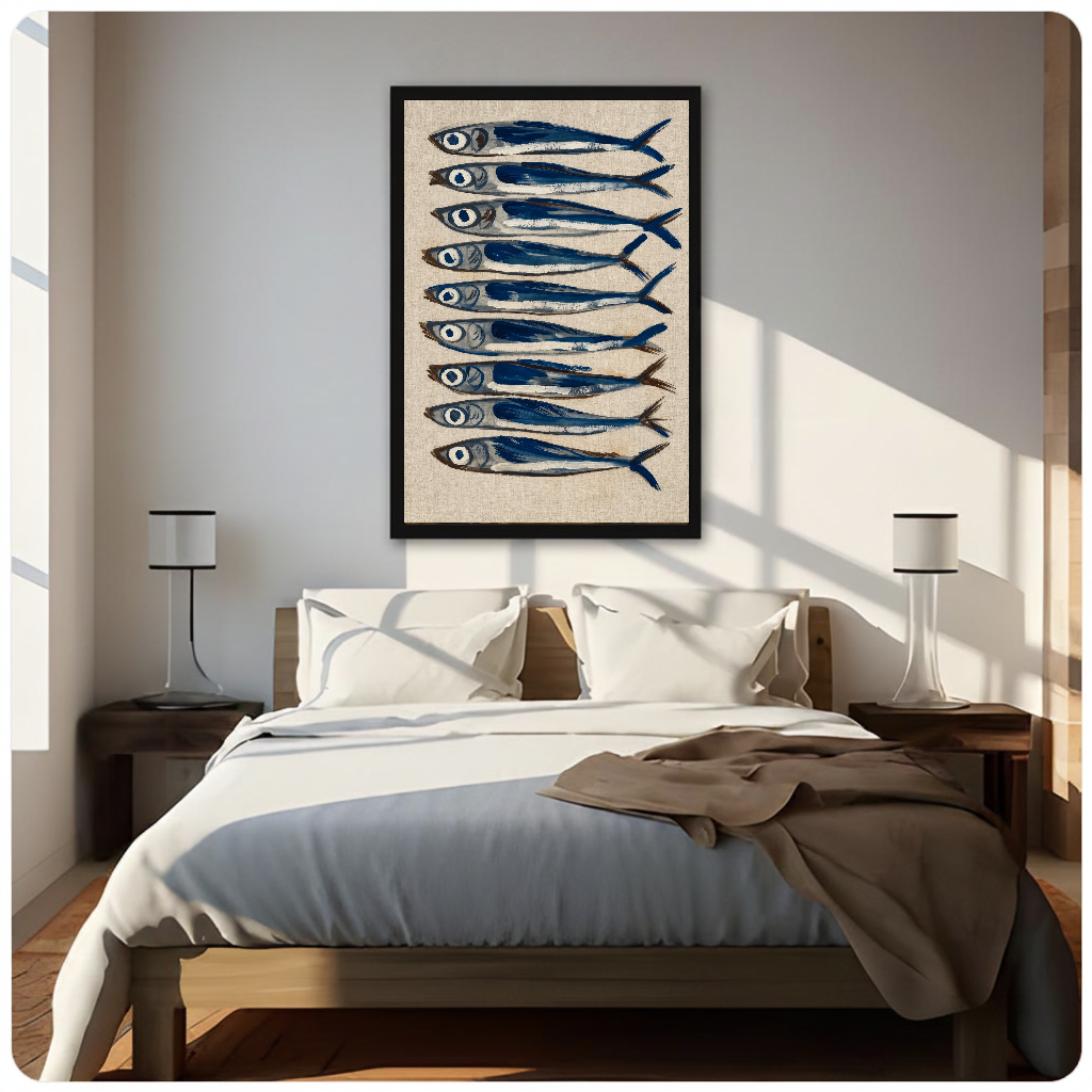 Framed nine blue sardines canvas above a neutral bed beside soft bedroom lighting and lamps.