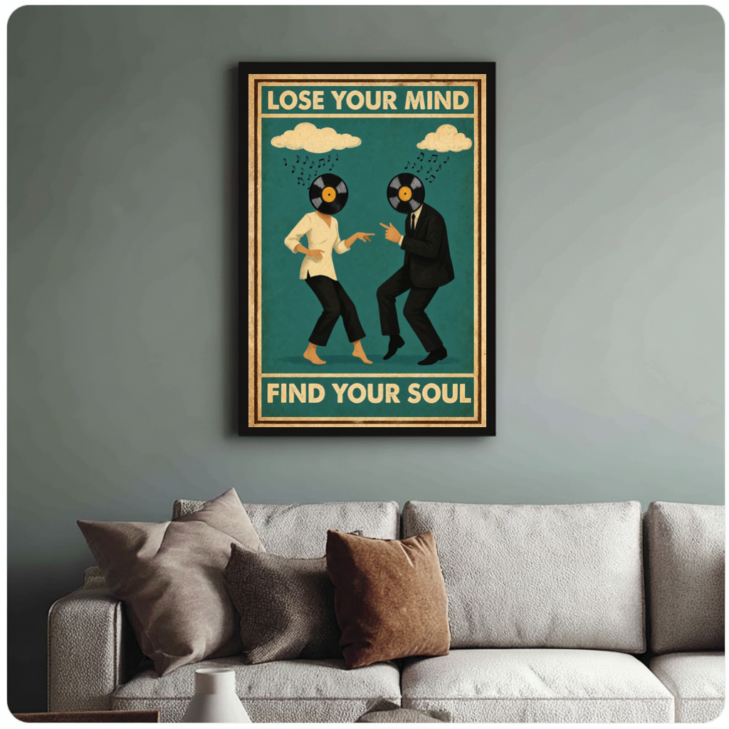 Framed vinyl head dancing couple canvas above a neutral sofa with cushions against a muted wall.