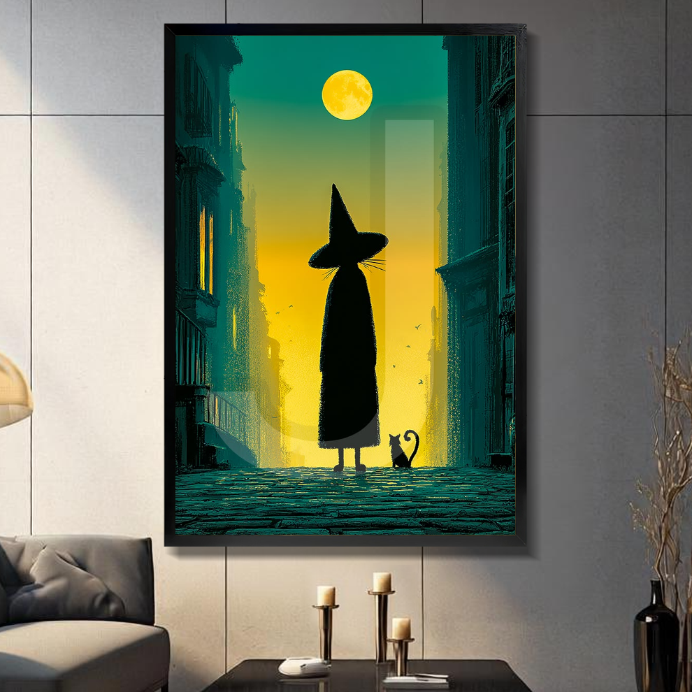 Black framed witch cat moonlit city canvas on a dark paneled wall beside warm candles.