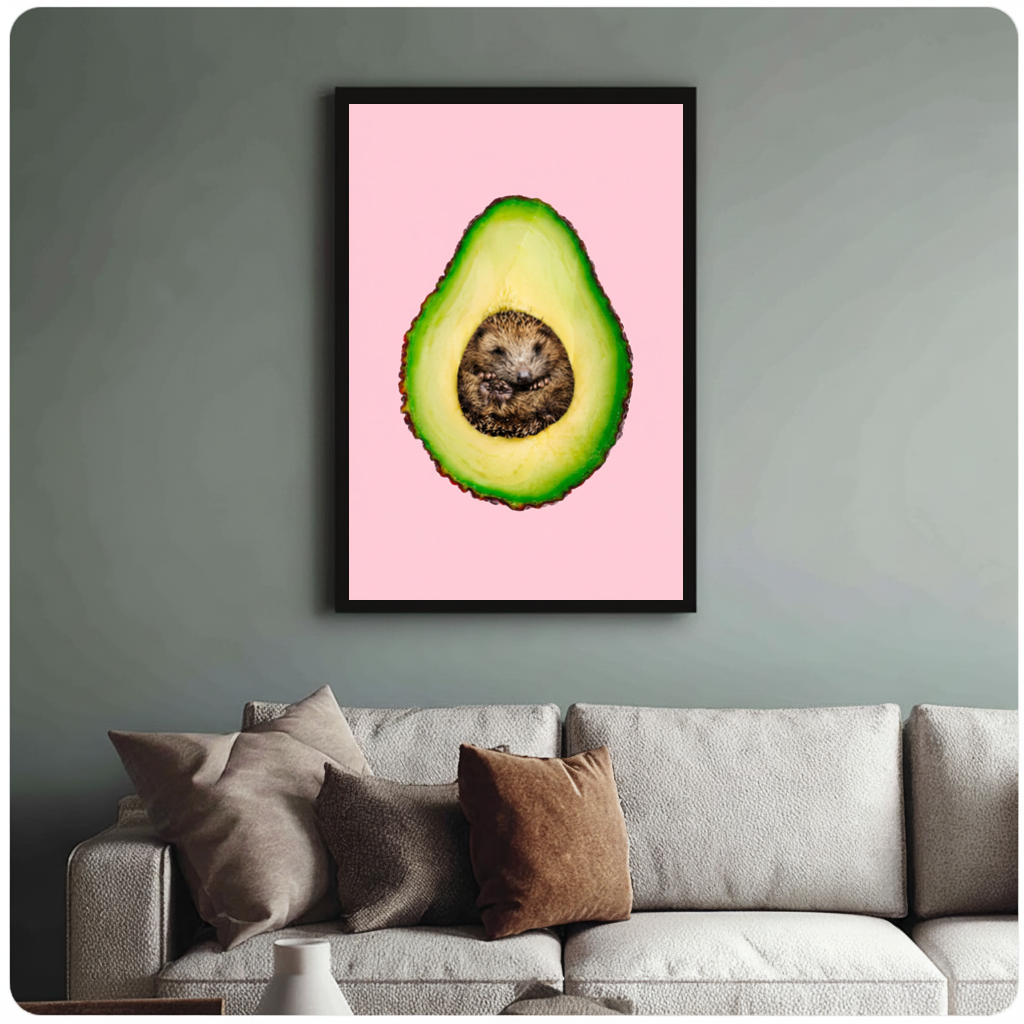 Framed avocado hedgehog canvas above a neutral sofa with cushions against a muted wall.