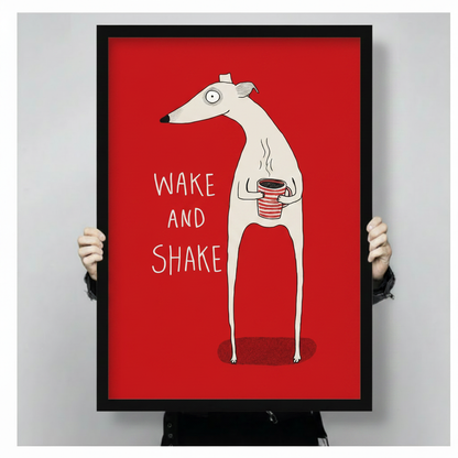 Hand-held size reference of framed "Wake and Shake" greyhound coffee illustration print on red background, showing portrait orientation