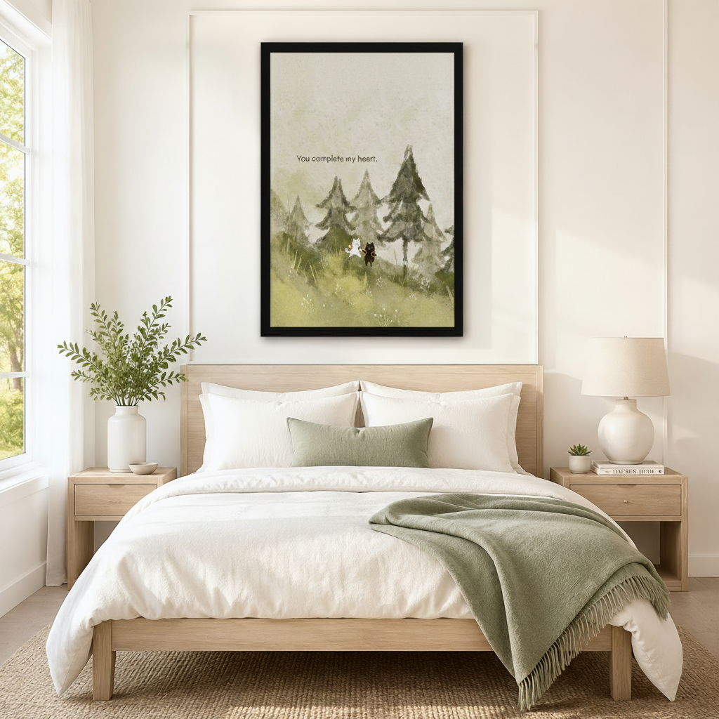 Black framed watercolor you complete my heart white cat and black dog canvas art with a small cat and dog standing together on a misty pine forest slope beside the hand-lettered quote in soft sage green washes, hung above a wooden bed frame in a sun-drenched bedroom with crisp white linen bedding, a sage green throw, and a round white nightstand lamp