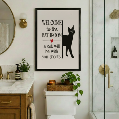 Welcome to the Bathroom funny black cat framed art print above toilet in luxury bathroom with gold fixtures marble countertop and round mirror - witty cat typography canvas for elegant bathroom decor