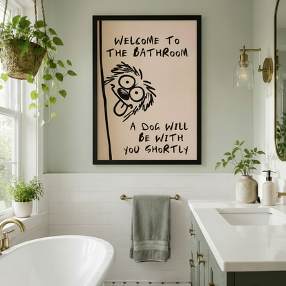 Witty peeking dog framed canvas bathroom art styled above a freestanding bathtub in a bright white subway tile bathroom with brass sconce and hanging green plants