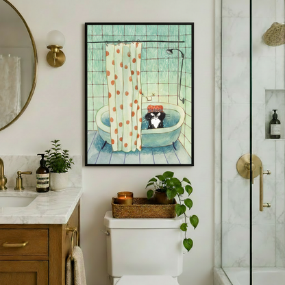 Black framed vintage-style grumpy cat in bathtub canvas art featuring a disgruntled tuxedo cat in a red polka dot shower cap in a teal tub with an orange dotted shower curtain on a mint tiled wall, displayed in an elegant bathroom above a toilet with brass fixtures, round mirror, wooden marble vanity, trailing pothos plant, and glass shower enclosure