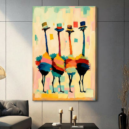 Four colorful ostriches wearing top hats frameless gallery wrap stretched canvas on gray wall above console table with pillar candles and black vase