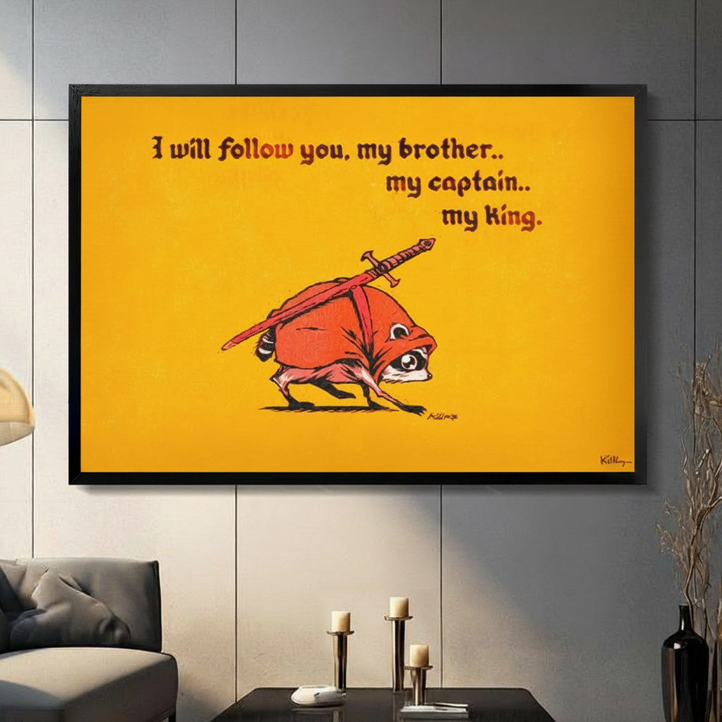 Black framed whimsical raccoon knight My King canvas art with a small hunched red-cloaked raccoon warrior with big expressive eyes carrying a long sword on its back charging forward on a bold vivid golden yellow background with dark red medieval hand-lettered quote I Will Follow You My Brother My Captain My King signed Killroy, hung on a gray panel wall above a dark gray sofa