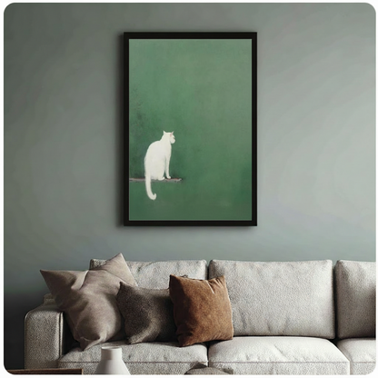 White cat on perch framed art print above grey bouclé sofa on sage blue-green wall - calm minimalist cat canvas wall decor with tonal green palette