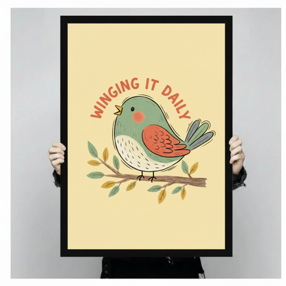 Bold retro cartoon illustration art print with the arched text winging it daily in warm terracotta red lettering curving above a round chubby bird on a leafy branch the bird has a muted teal-green round body white speckled chest orange-red feathered wing blue-gray tail feathers a small yellow pointed beak and a pink rosy cheek dot with its right wing raised slightly as if waving small teal and yellow-gold leaves dot the branch on a warm pastel yellow cream background fun positive quote retro bird art framed