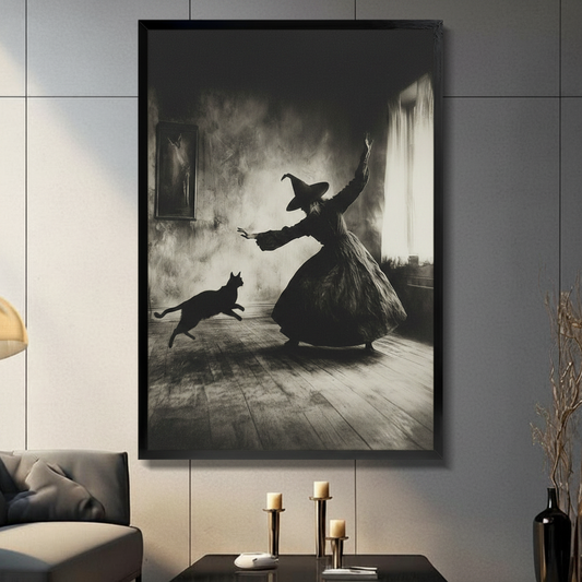 Framed gothic wall art of a witch casting spell with a leaping black cat, displayed in a modern living room