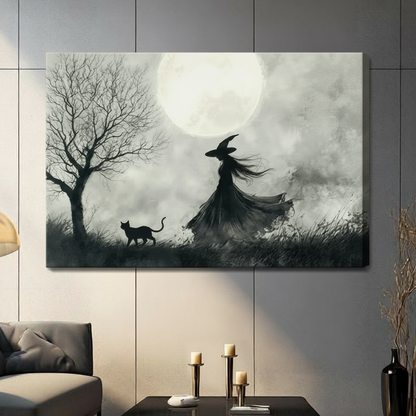 Gallery wrap canvas of a dramatic witch silhouette with windswept cloak and pointed hat striding beside a black cat through a misty moonlit landscape with a bare tree, hung on a grey panelled wall