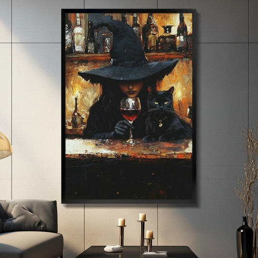 Framed canvas wall art of a mysterious witch in a wide-brim hat sipping red wine beside a black cat at a candlelit bar, displayed in a moody living room