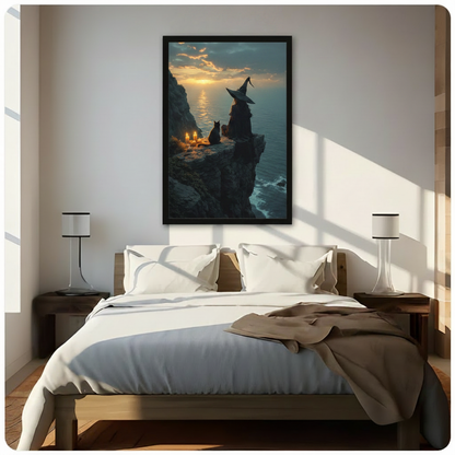 Framed witch and black cat canvas wall art hung above a bed in a bright bedroom, depicting a moody gothic sunset over the sea