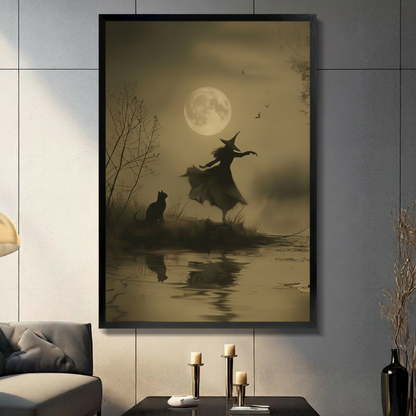Framed gothic wall art print of a witch dancing by moonlight with a black cat, displayed in a moody living room with candle holders