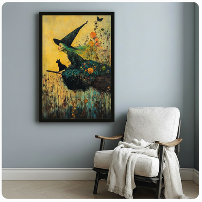 Green-haired witch on broomstick with black cat framed fantasy art poster beside white armchair on light grey wall