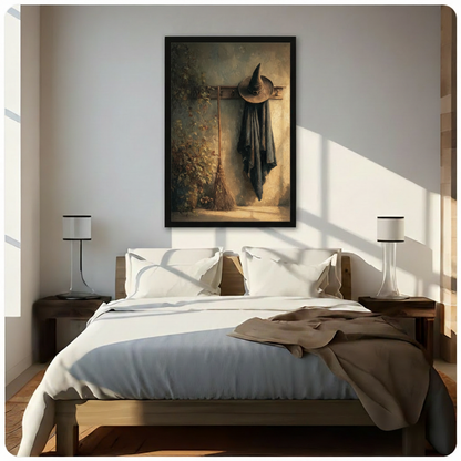 Witch hat canvas wall art held by hands, featuring a dark cloak, pointed hat, and rustic broom