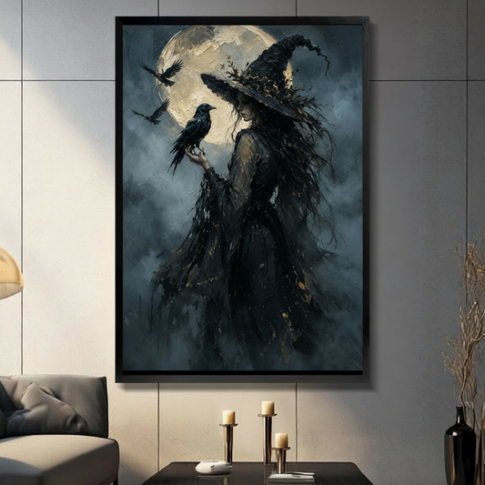 Dark witch with raven framed canvas wall art black frame on gray panel wall above black candlestick table in modern living room