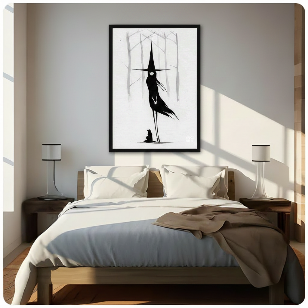 Black framed witch silhouette art print hung above bed in sunlit bedroom with neutral linen bedding
