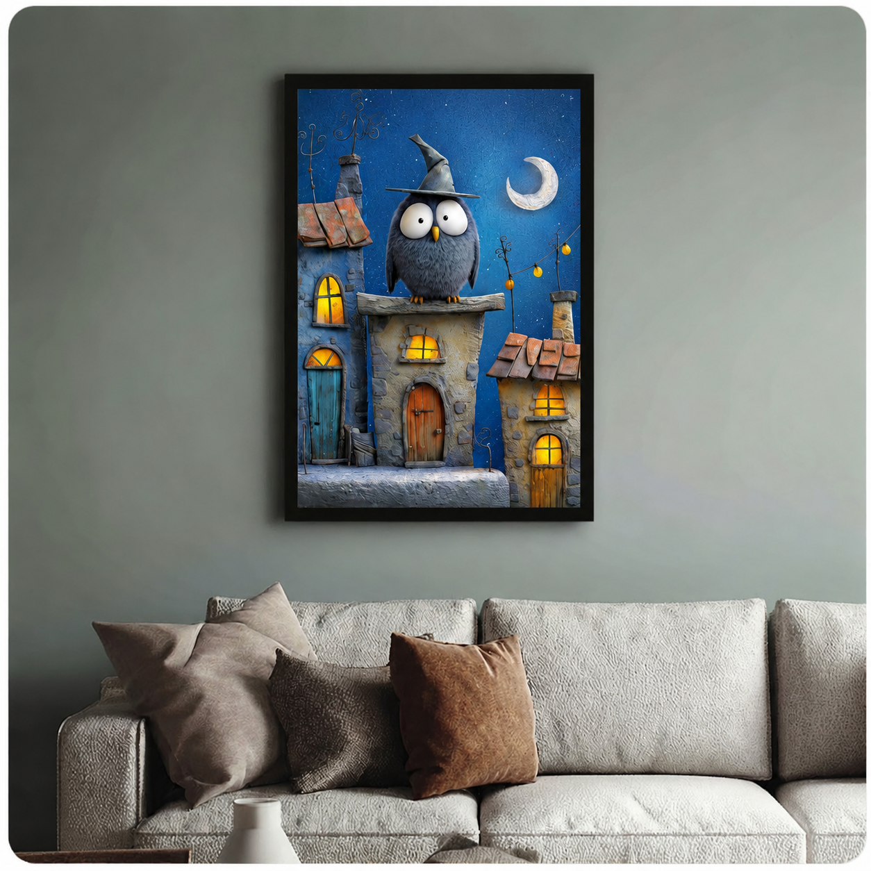 Wizard owl painting in black frame above sofa — whimsical owl on stone rooftop under crescent moon, enchanted village wall art
