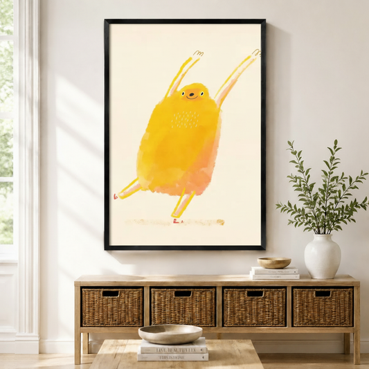 Happy dancing yellow bird framed canvas print displayed above wicker storage bench in a bright modern American entryway