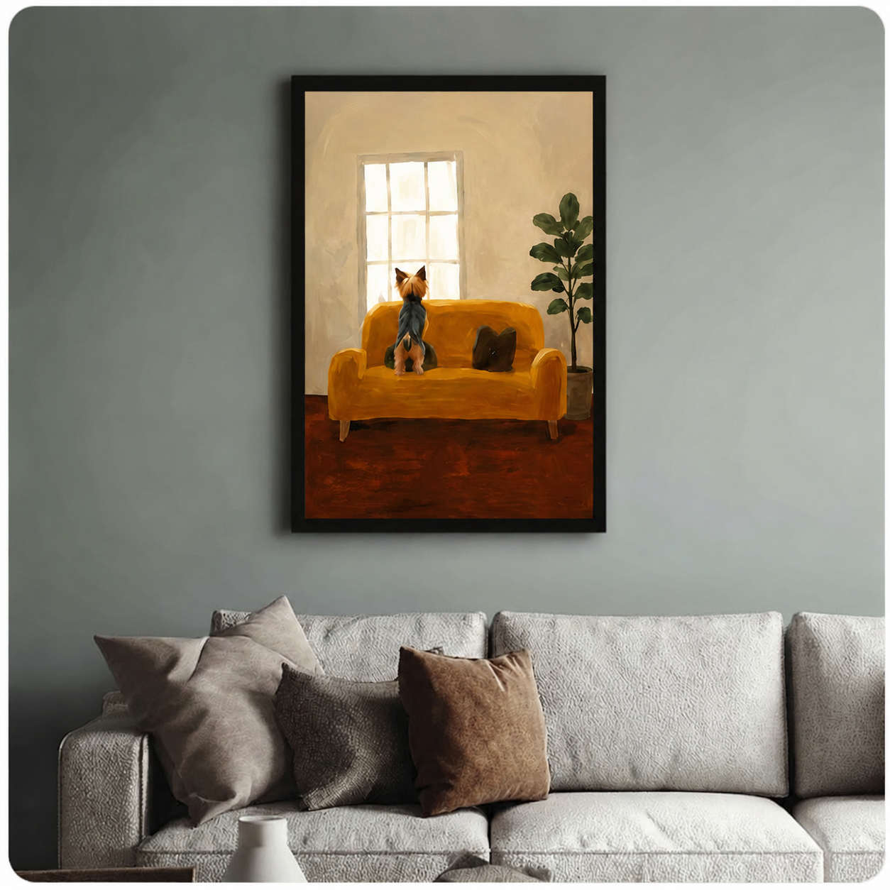 Framed Yorkshire Terrier wall art print showing small dog on mustard sofa by sunlit window, displayed above grey sofa in modern living room